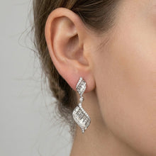 18K White Gold Natural Diamond Swirl Drop Earrings | Sculptural Pavé Ribbon Silhouette