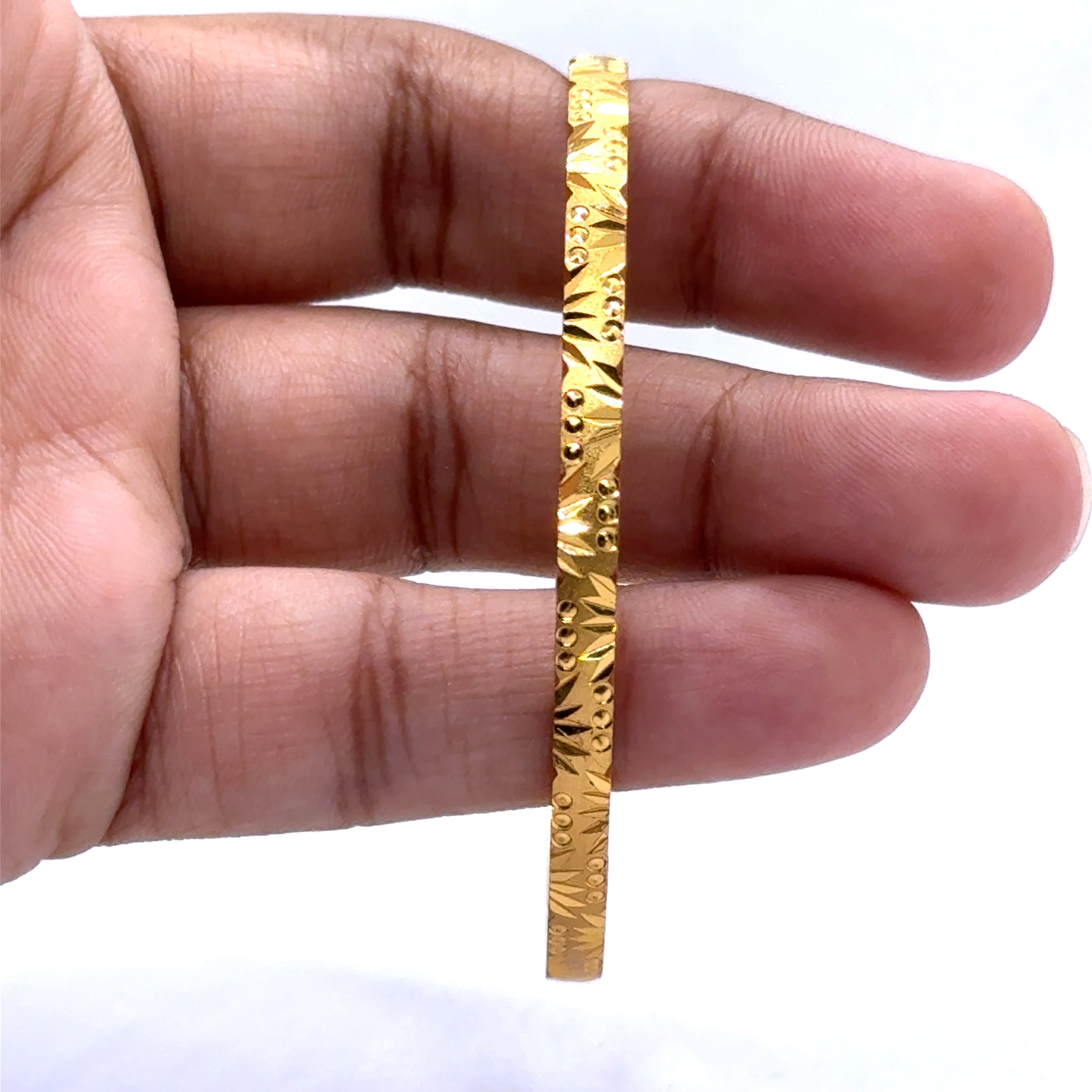 Traditional Gold Bangles with Yellow Gold Plating, Engraved Segments, and Geometric-Inspired Motifs Electro Gold Plated Bangle