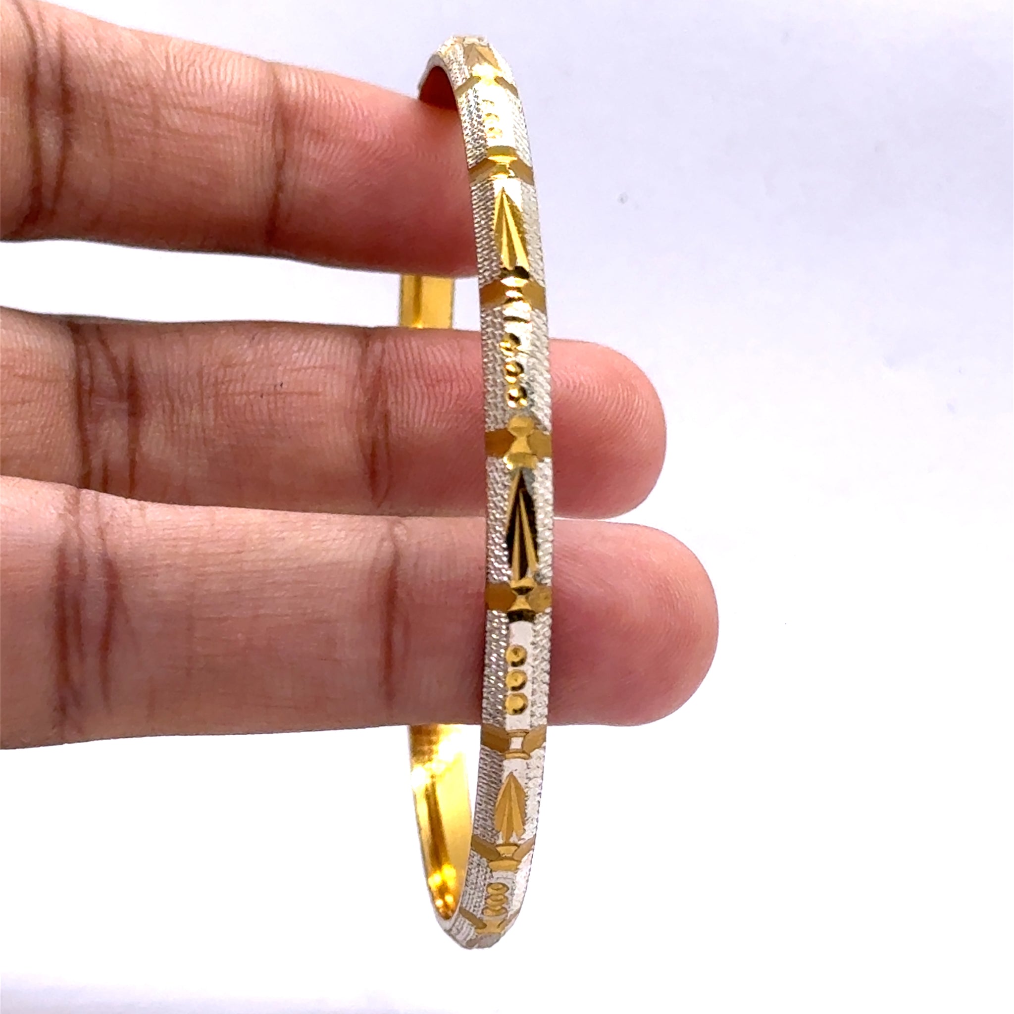 White Yellow Gold Plated metal Bangles Showcasing Traditional Design with Engraved Geometric Elements