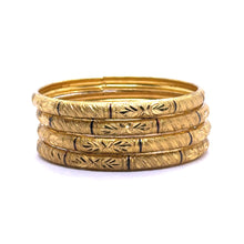 Set of Yellow Gold Plated metal Bangles with Artistic Engraved Segments and Classic Geometric Patterns