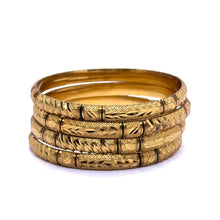 Traditional Yellow Gold Plated metal Bangles with Intricate Engraving and Symmetrical Geometric Textures