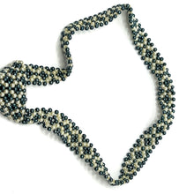 Handcrafted Circle Pattern Pearl Tie Timeless Circular Elegance