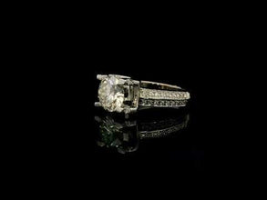 9K White Gold Diamond Ring | Classic Round Solitaire | Channel-Set Band Design | Elegant Bridal Style